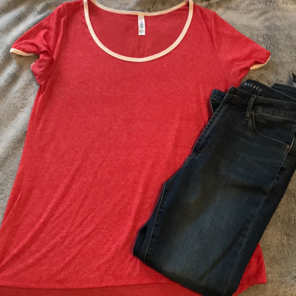 Heathered soft t-shirt. Fits best as large